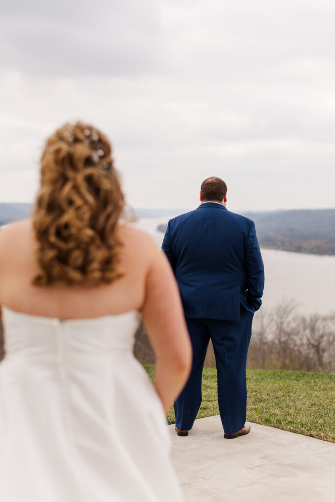 Photo of first look between bride and groom