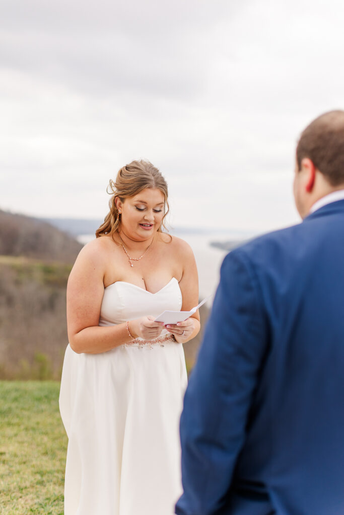 Photo of bride and groom exchanging private vows