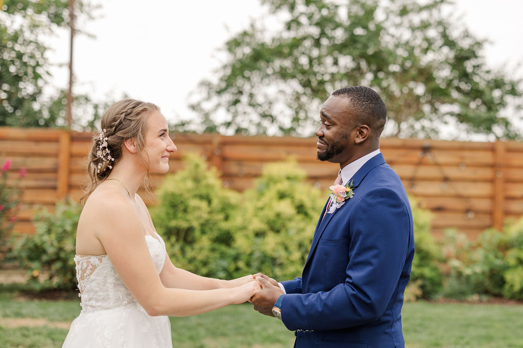 First look between the bride and the groom at The Marmalade Lily