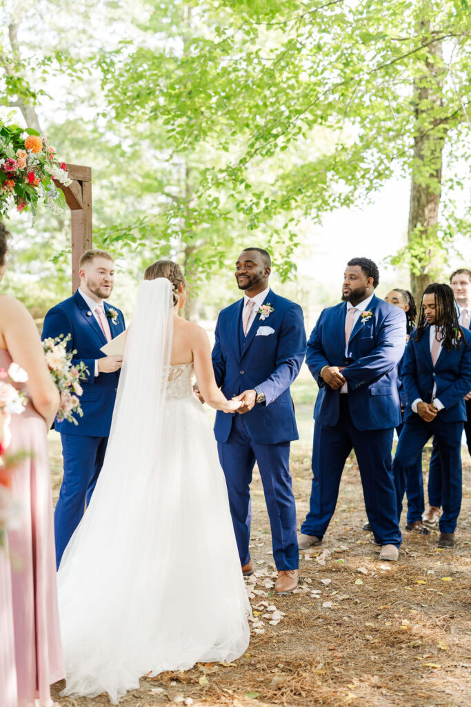 Bride and groom during the ceremony at the marmalade lily