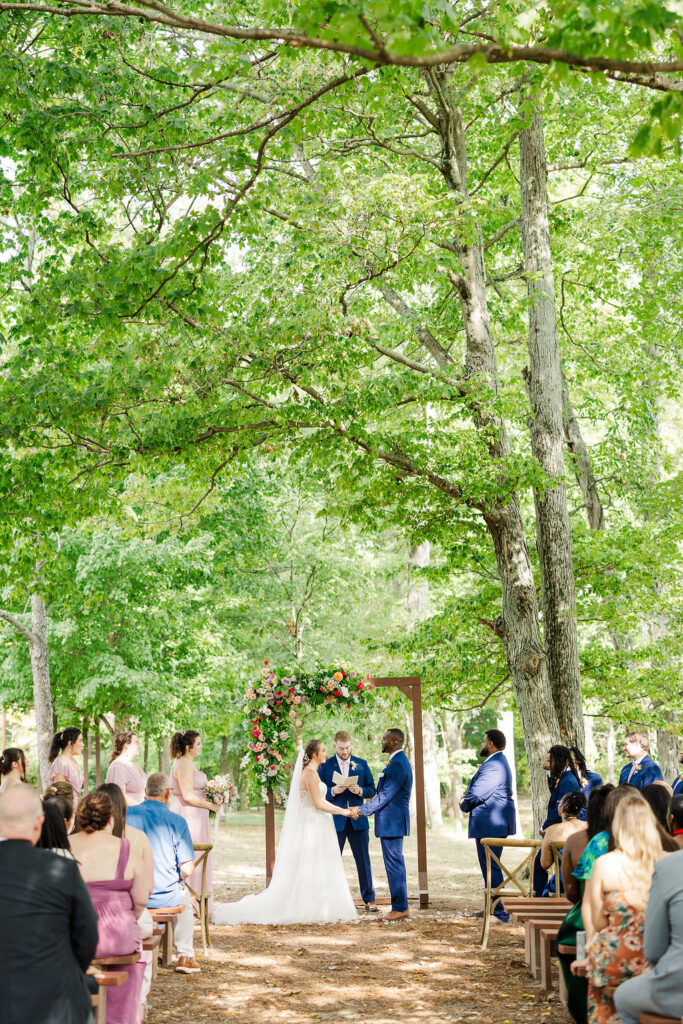 Bride and groom during the ceremony at the marmalade lily