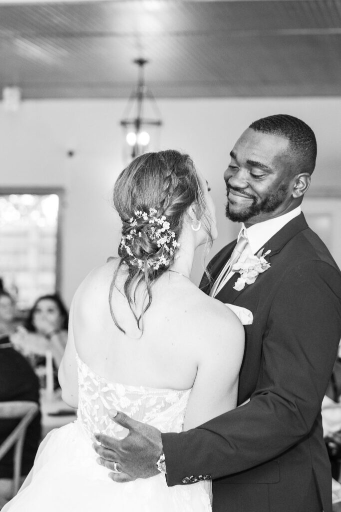 Bride and groom's first dance at reception at the marmalade lily 