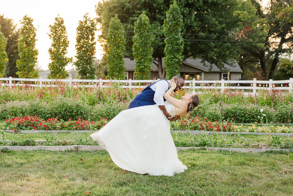 Sunset portraits of the bride and groom in the gardens at the marmalade lily