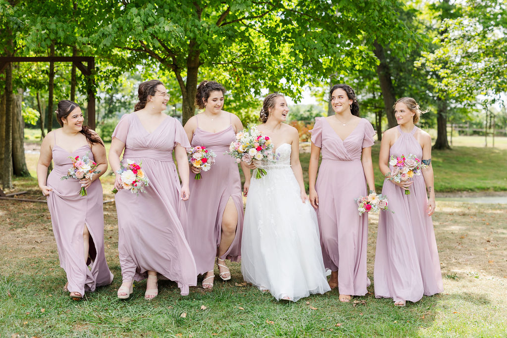 Bridesmaids in the gardens at the marmalade lily