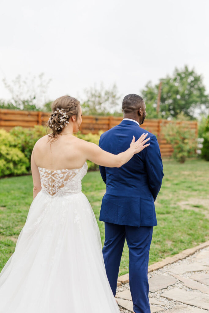 First look between the bride and the groom at The Marmalade Lily