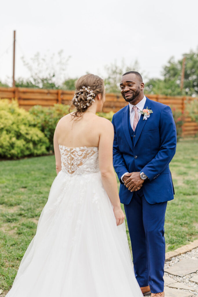 First look between the bride and the groom at The Marmalade Lily